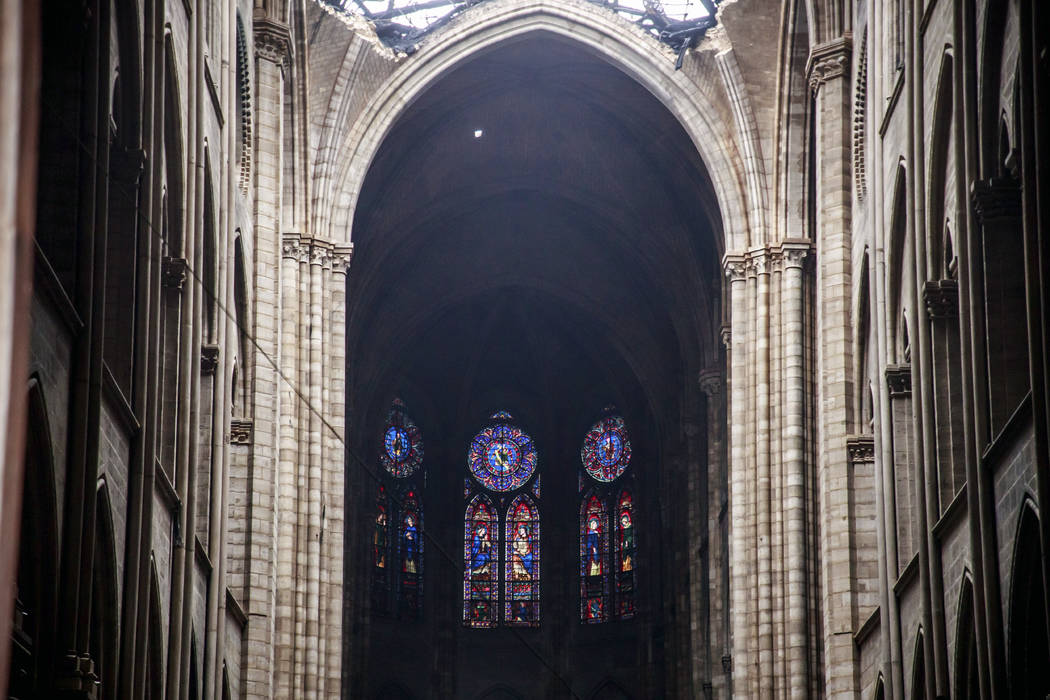 The glass windows are pictured inside the damaged Notre Dame cathedral in Paris, Tuesday, April ...