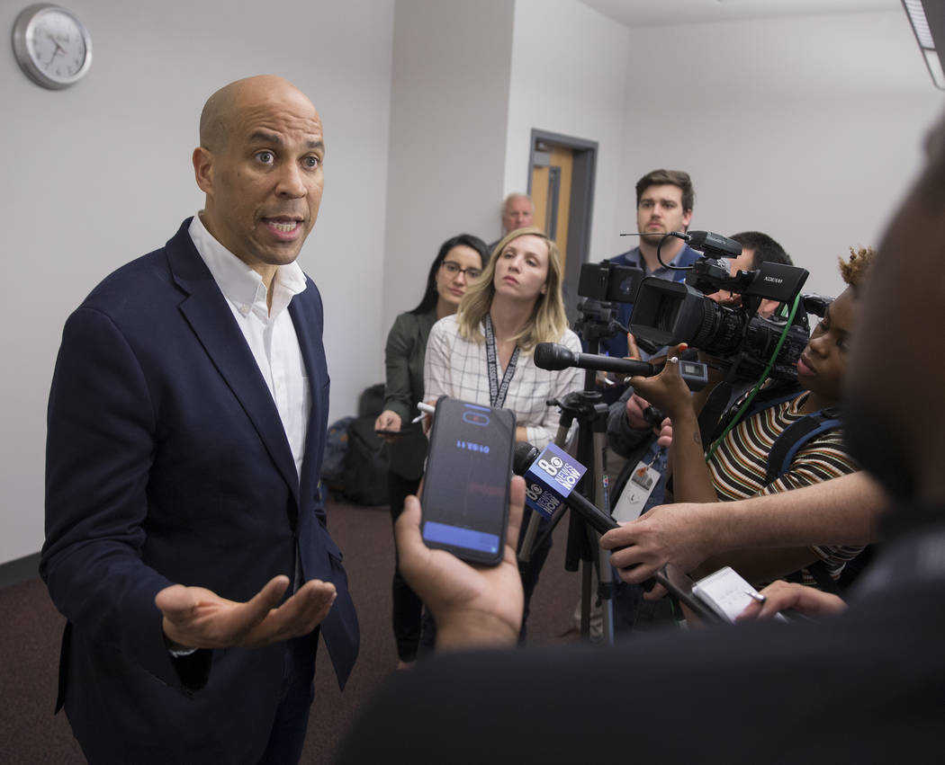 Democratic presidential candidate Sen. Cory Booker, D-N.J. takes questions from the media befor ...