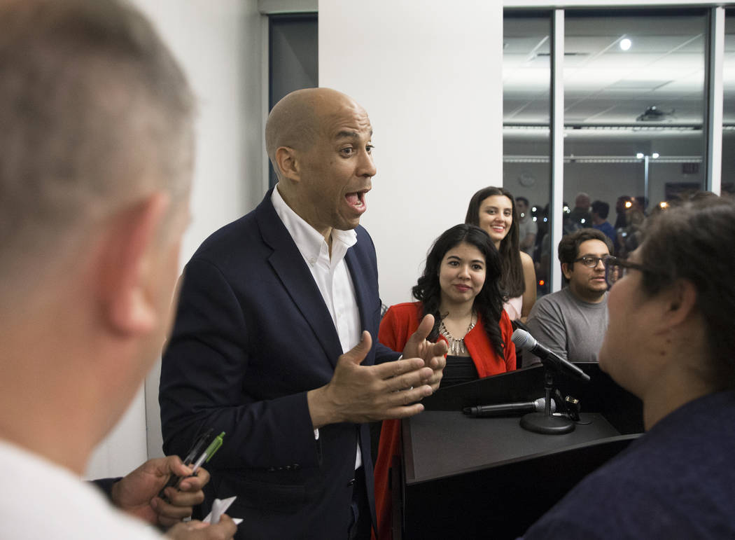 Democratic presidential candidate Sen. Cory Booker, D-N.J., speaks to supporters at the conclus ...