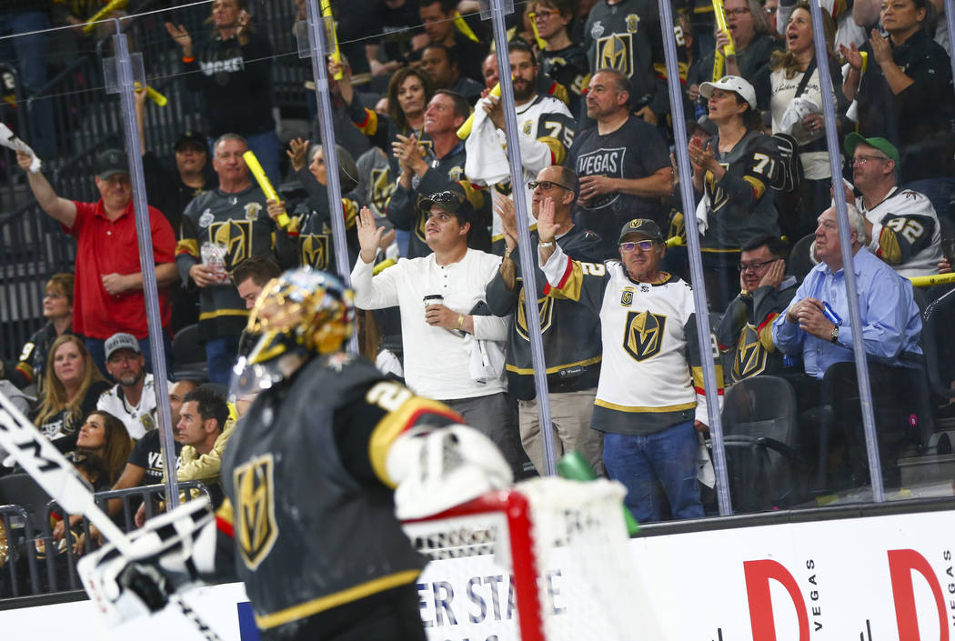 Golden Knights fans celebrate a block by Golden Knights goaltender Marc-Andre Fleury (29) durin ...