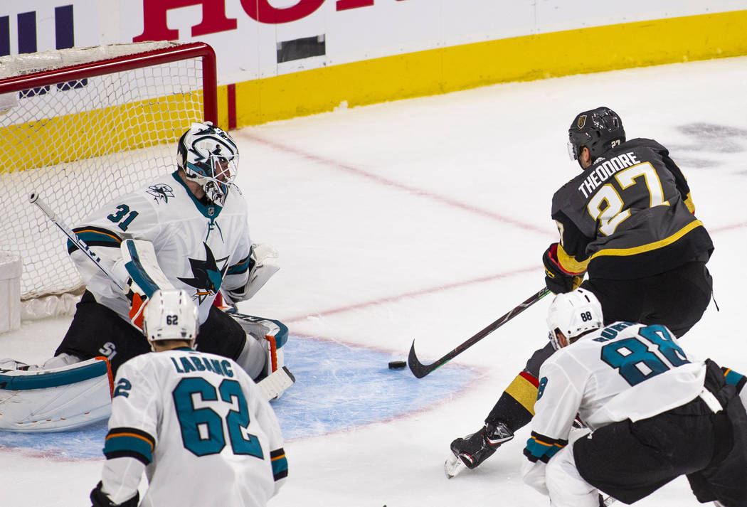 Golden Knights defenseman Shea Theodore (27) readies to score on San Jose Sharks goaltender Mar ...