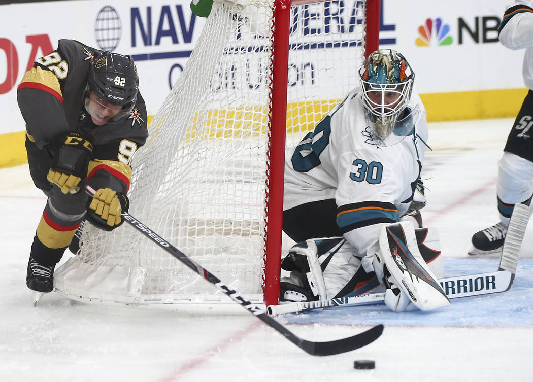 Golden Knights left wing Tomas Nosek (92) tries to score against San Jose Sharks goaltender Aar ...