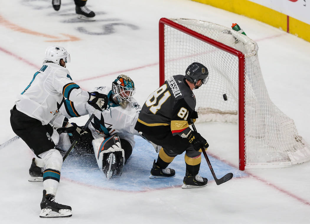 Vegas Golden Knights center Jonathan Marchessault (81) scores against San Jose Sharks goaltende ...