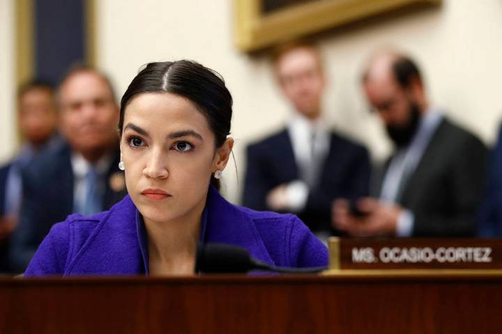 In this Wednesday, April 10, 2019, file photo, Rep. Alexandria Ocasio-Cortez, D-N.Y., listens d ...