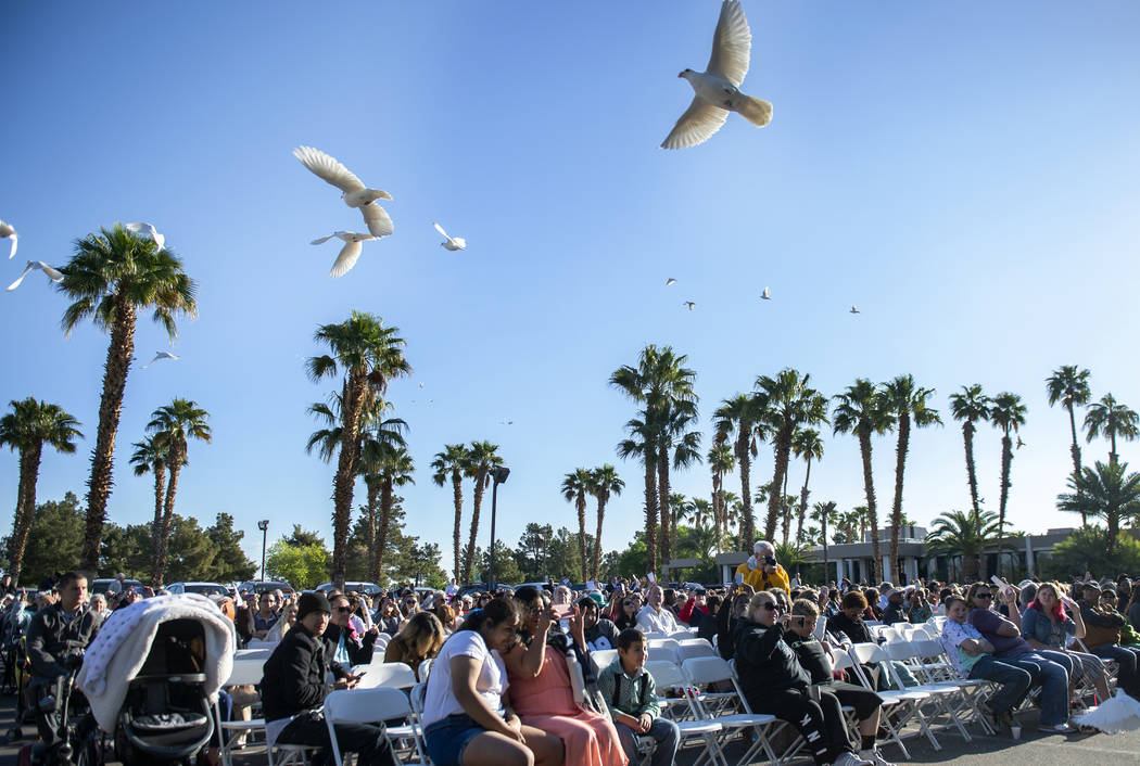 Doves are released during the song "You Raise Me Up" during a sunrise Easter service ...