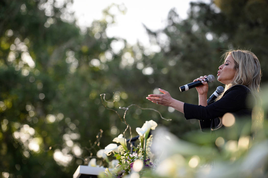 Lily Arce sings "You Say" at a sunrise Easter service at the Palm Mortuaries and Cem ...