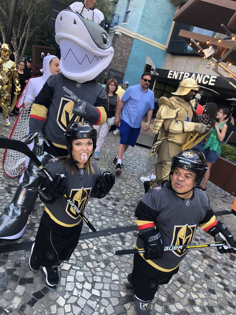 Brian Thomas, Lorren Cackowski and the shark from Shark Reef at Mandalay Bay are shown at New Y ...