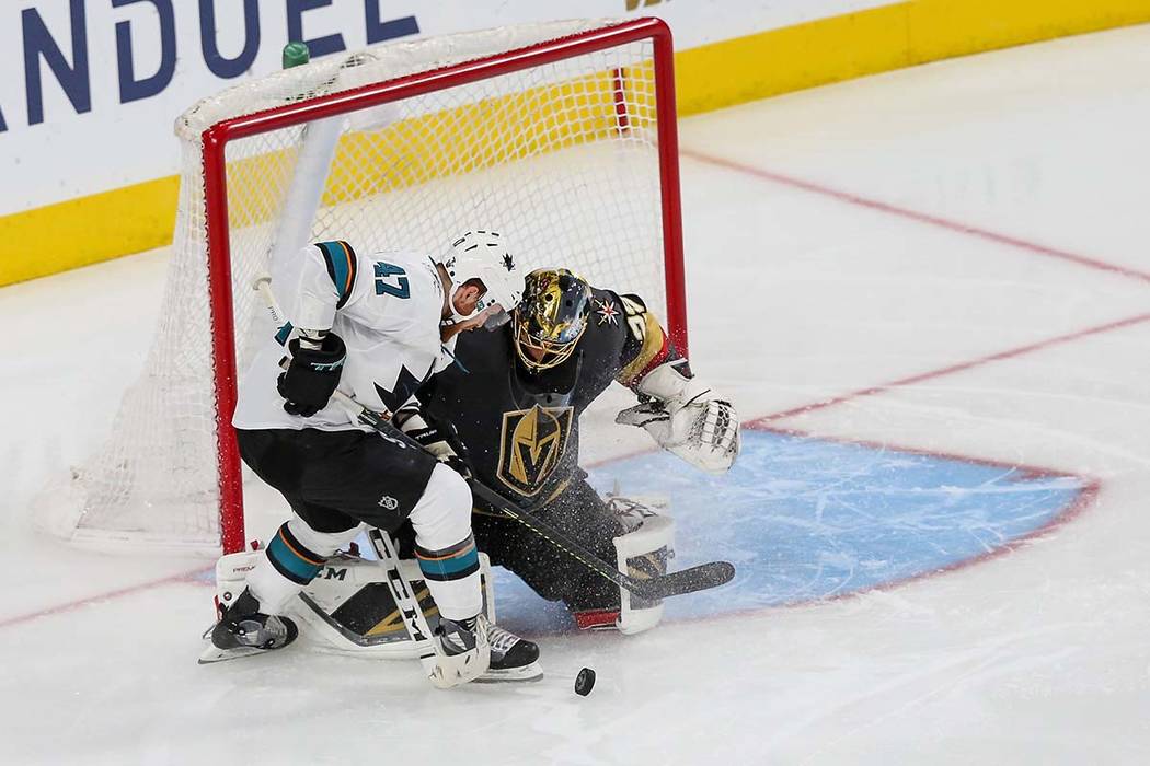 San Jose Sharks defenseman Joakim Ryan (47) takes a shot against Vegas Golden Knights goaltende ...