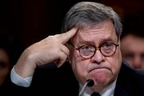 U.S. Attorney General William Barr reacts April 10, 2019, as he appears before a Senate Appropr ...
