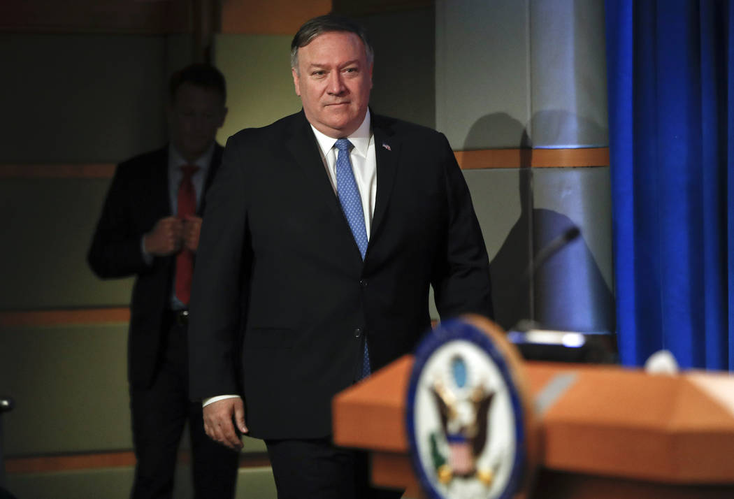 Secretary of State Mike Pompeo arrives to speak at the State Department in Washington, Wednesda ...