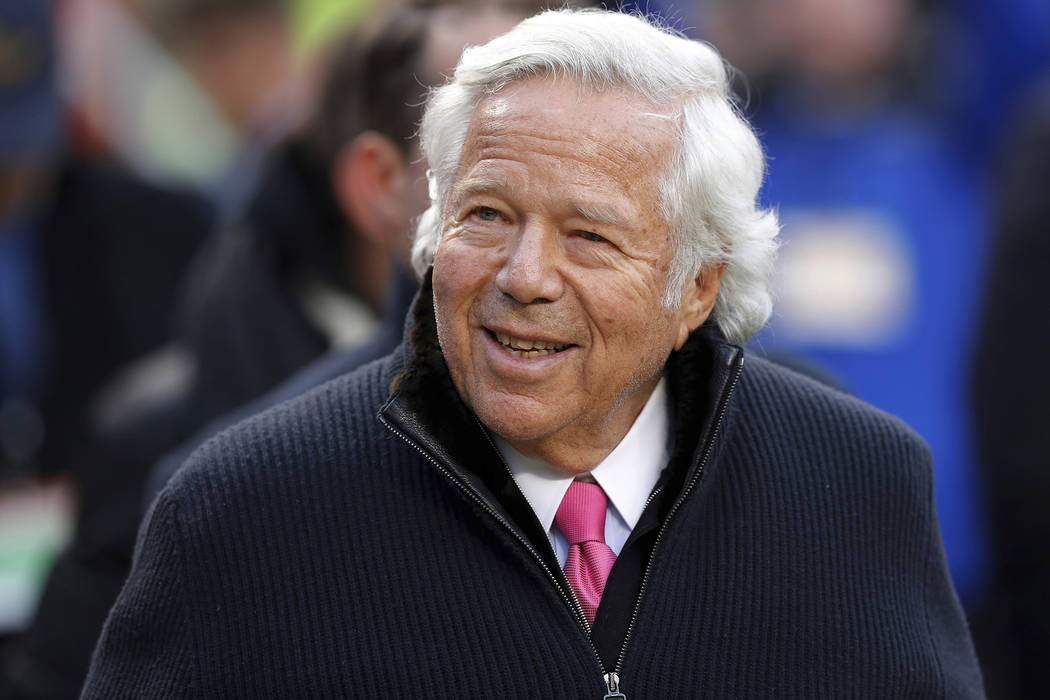 FILE - In this Jan. 20, 2019, file photo, New England Patriots owner Robert Kraft walks on the ...
