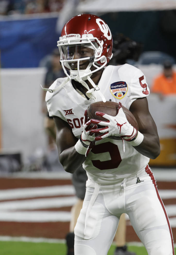 Oklahoma wide receiver Marquise Brown (5) warms up before the Orange Bowl NCAA college football ...