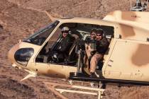 A helicopter flies over the Gunship Helicopters site in Sandy Valley, south of Las Vegas. (Guns ...