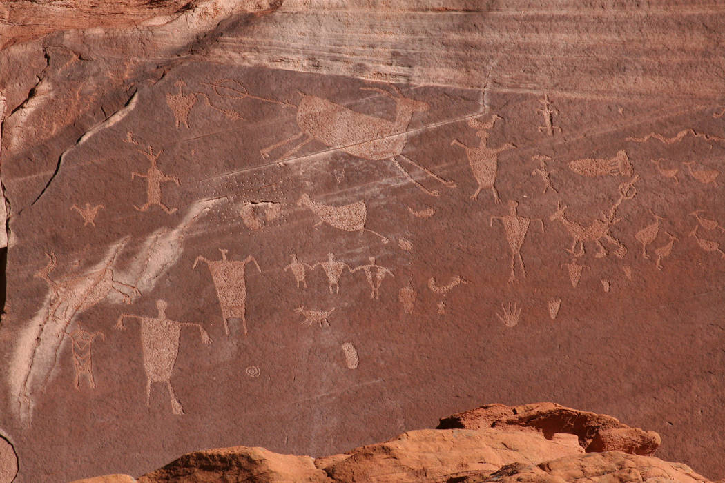Rock art such as pictographs and petroglyphs, the latter seen here, can be found throughout the ...