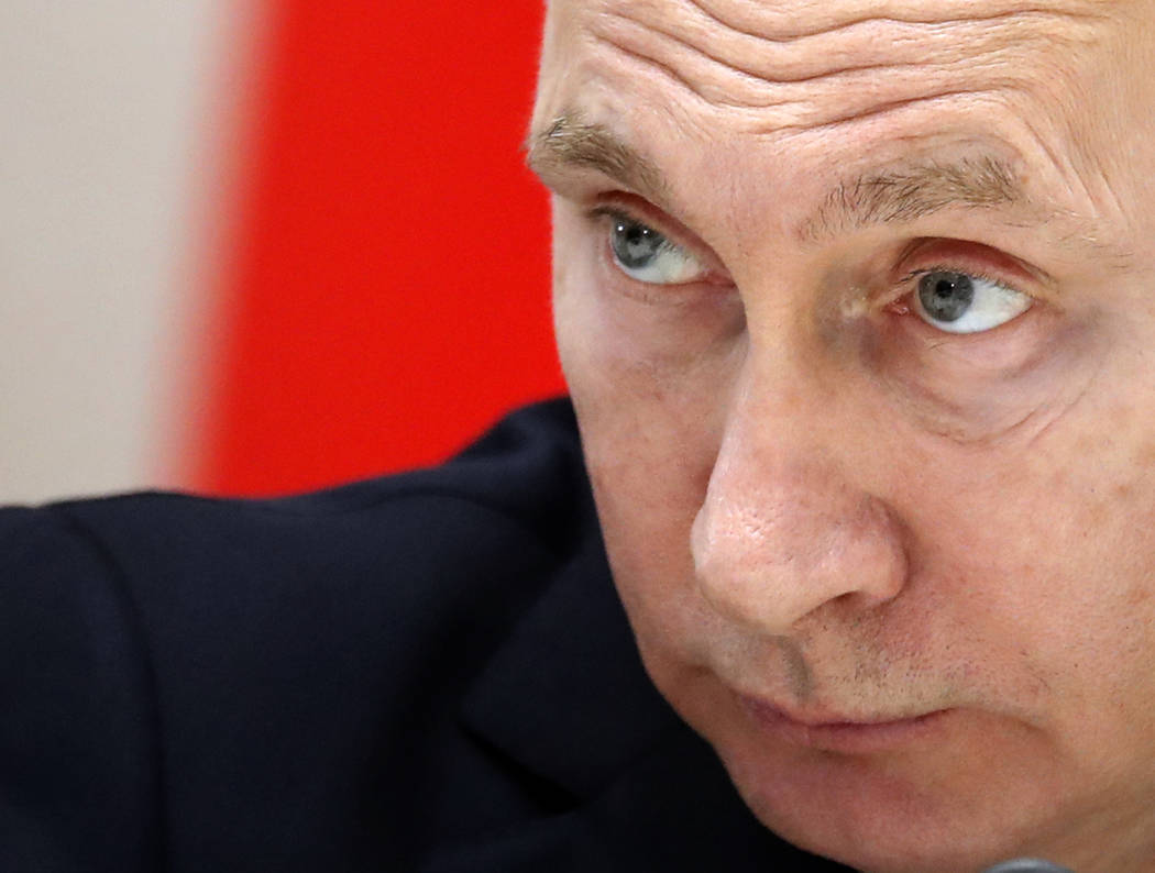 Russian President Vladimir Putin listens Feb. 14, 2019, during a meeting in the Bocharov Ruchei ...
