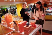 Visitors to Story walk through the shop at Macy's in New York on April 10, 2019. On Thursday, A ...