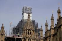 Britain's Houses of Parliament, covered in hoarding and scaffolding on Wednesday, April 17, 201 ...
