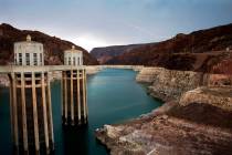 Lightning strikes July 28, 2014, over Lake Mead near Hoover Dam that impounds Colorado River wa ...