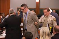 Defense lawyer Brian Bloomfield is taken into custody March 7, 2016, at the conclusion of a sen ...