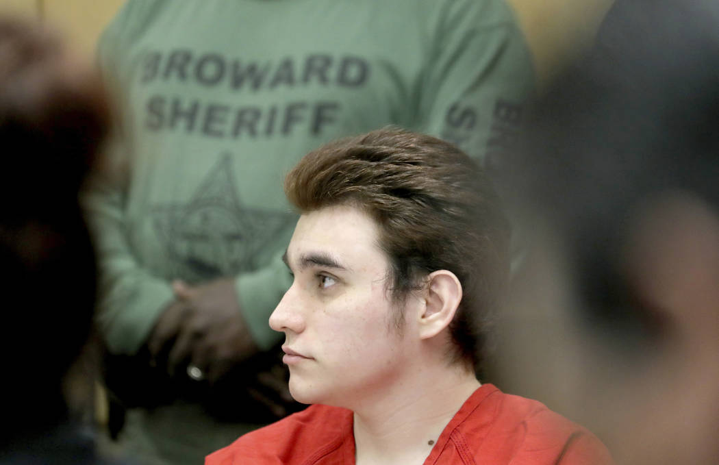 Parkland school shooting suspect Nikolas Cruz listens in court for a defense motion at the Brow ...