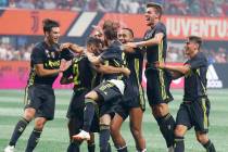Juventus defender Mattia De Sciglio (2) celebrates with his teammates after scoring the winning ...