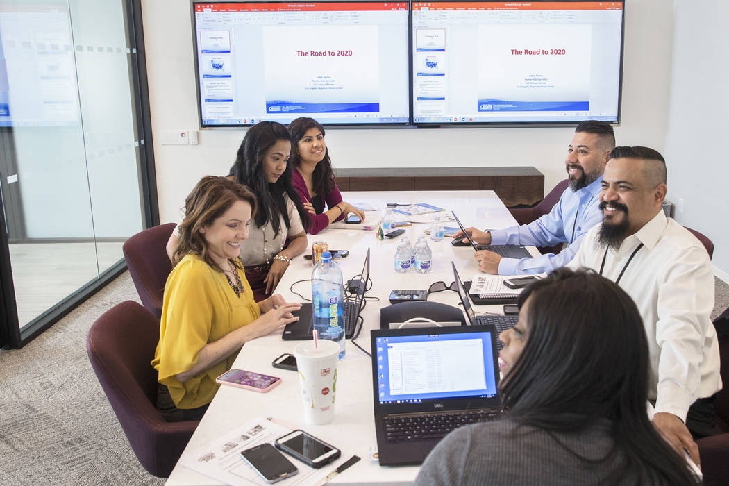 U.S. Department of Commerce partnership specialists meet to discuss the 2020 census on Friday, ...