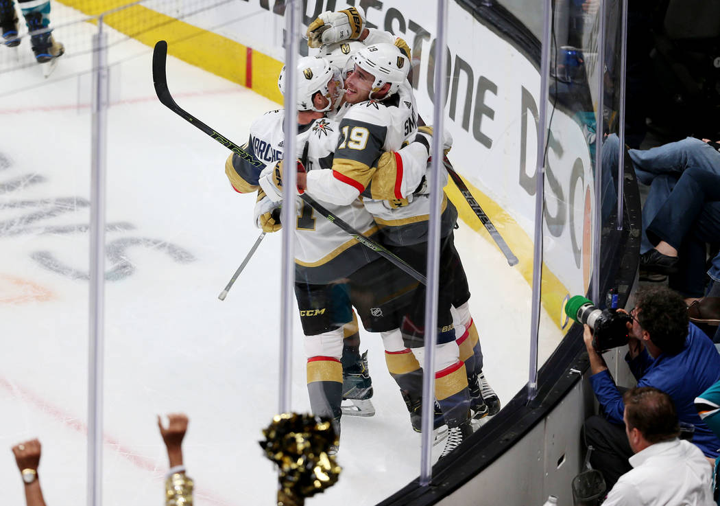 Vegas Golden Knights right wing Reilly Smith (19) celebrates a score with center Cody Eakin (21 ...