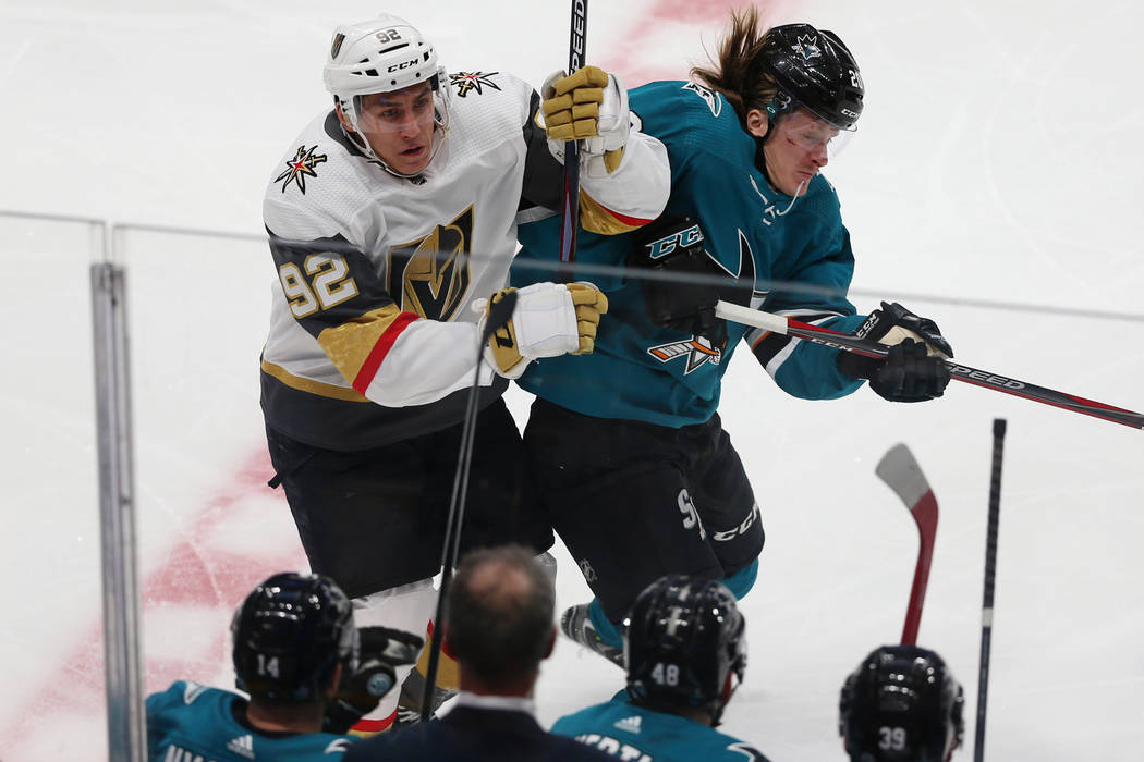 San Jose Sharks left wing Marcus Sorensen (20) pushes Vegas Golden Knights left wing Tomas Nose ...