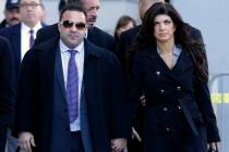 FILE - In this Nov. 20, 2013, file photo, Giuseppe "Joe" Giudice, left, and his wife, ...
