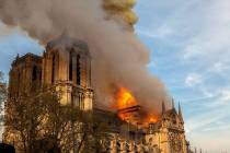 This photo taken on Monday April 15, 2019, shows Notre Dame cathedral burning in Paris. Firefig ...