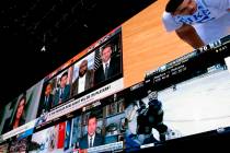 Giant video screens inside the sports betting lounge at the Tropicana casino in Atlantic City. ...