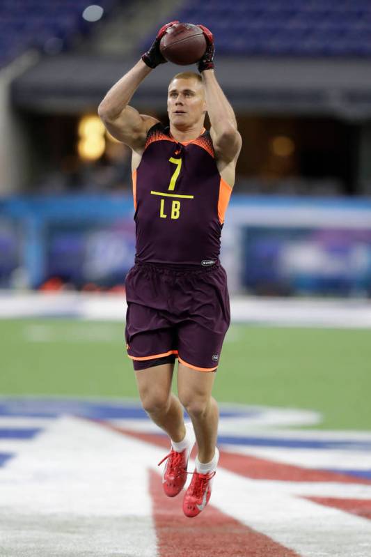 Utah linebacker Cody Barton runs a drill during the NFL football scouting combine, Sunday, Marc ...