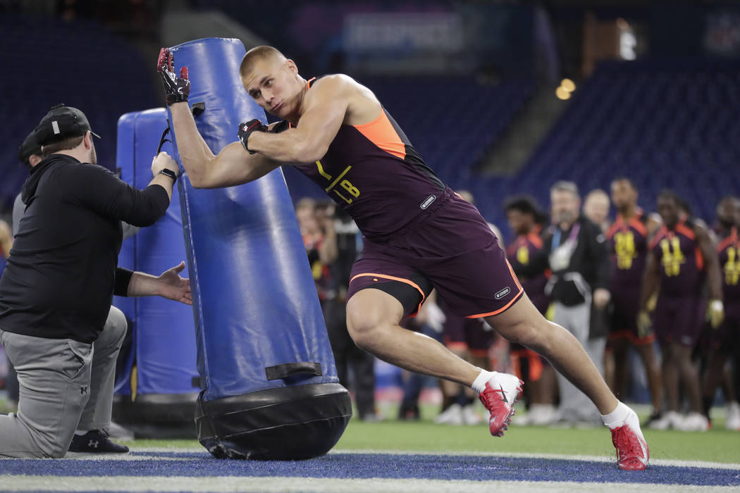 Utah linebacker Cody Barton runs a drill at the NFL football scouting combine in Indianapolis, ...