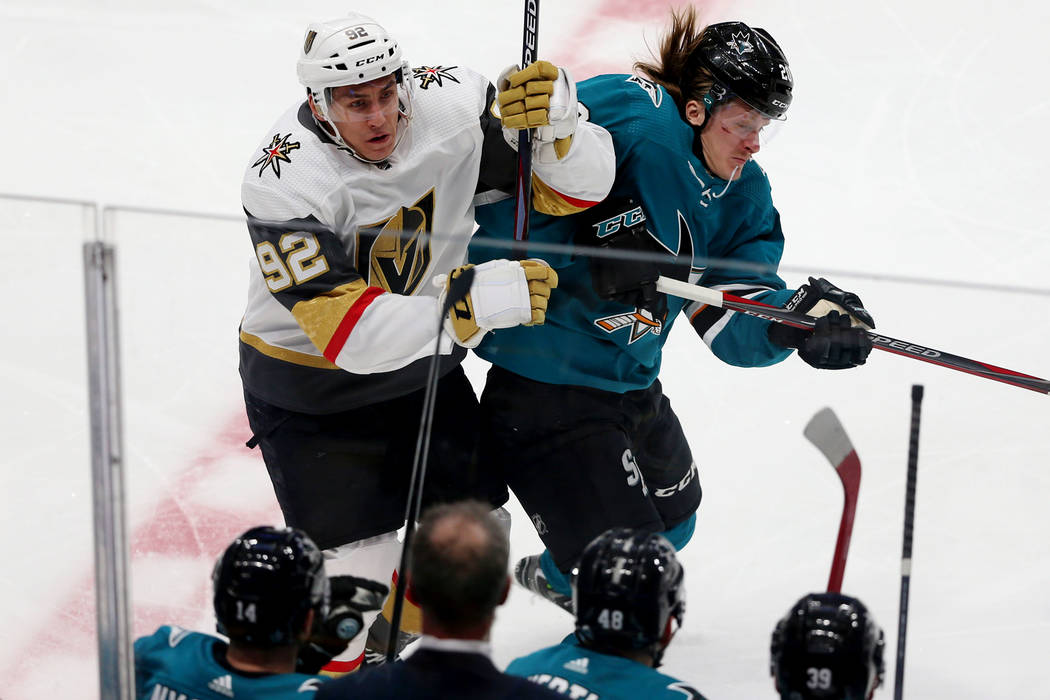 San Jose Sharks left wing Marcus Sorensen (20) pushes Vegas Golden Knights left wing Tomas Nose ...