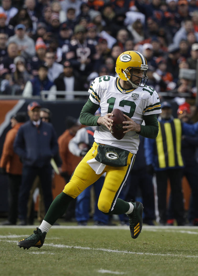 Green Bay Packers quarterback Aaron Rodgers (12) plays against the Chicago Bears during the fir ...