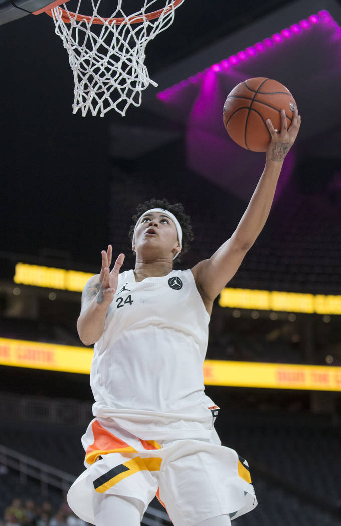 Kierstan Bell (24) drives to the rim in the fourth quarter during the Jordan Brand Classic All- ...