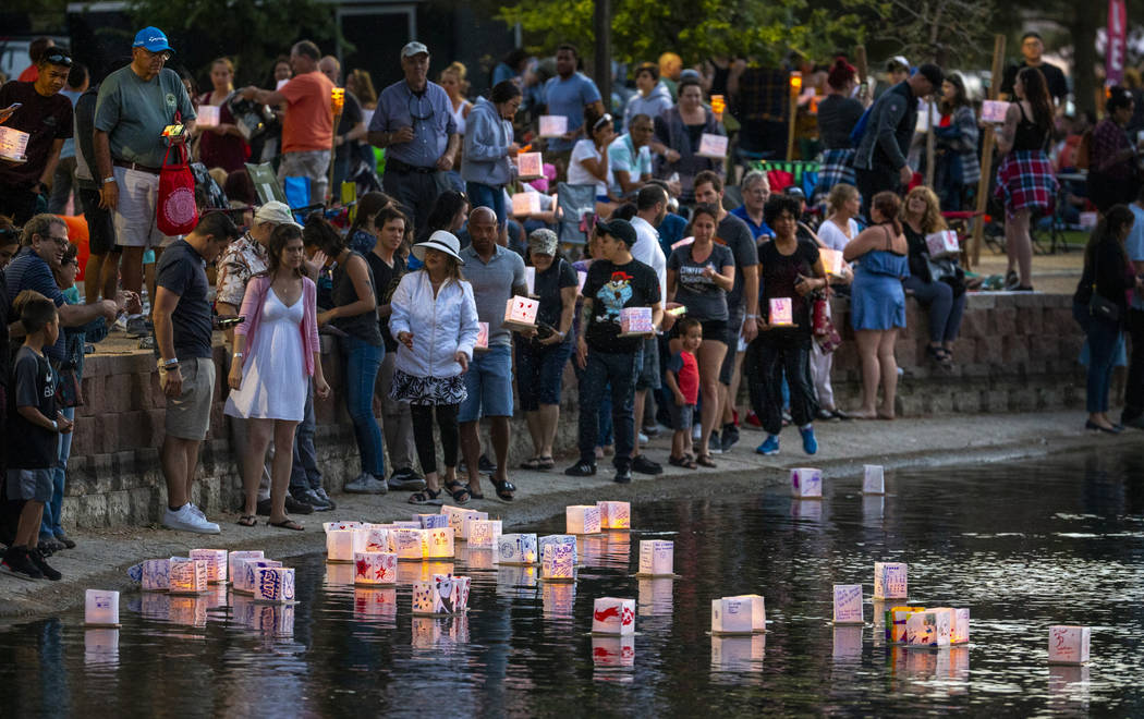 The first wave of lantern makes it to the water during the Water Lantern Festival at Sunset Par ...