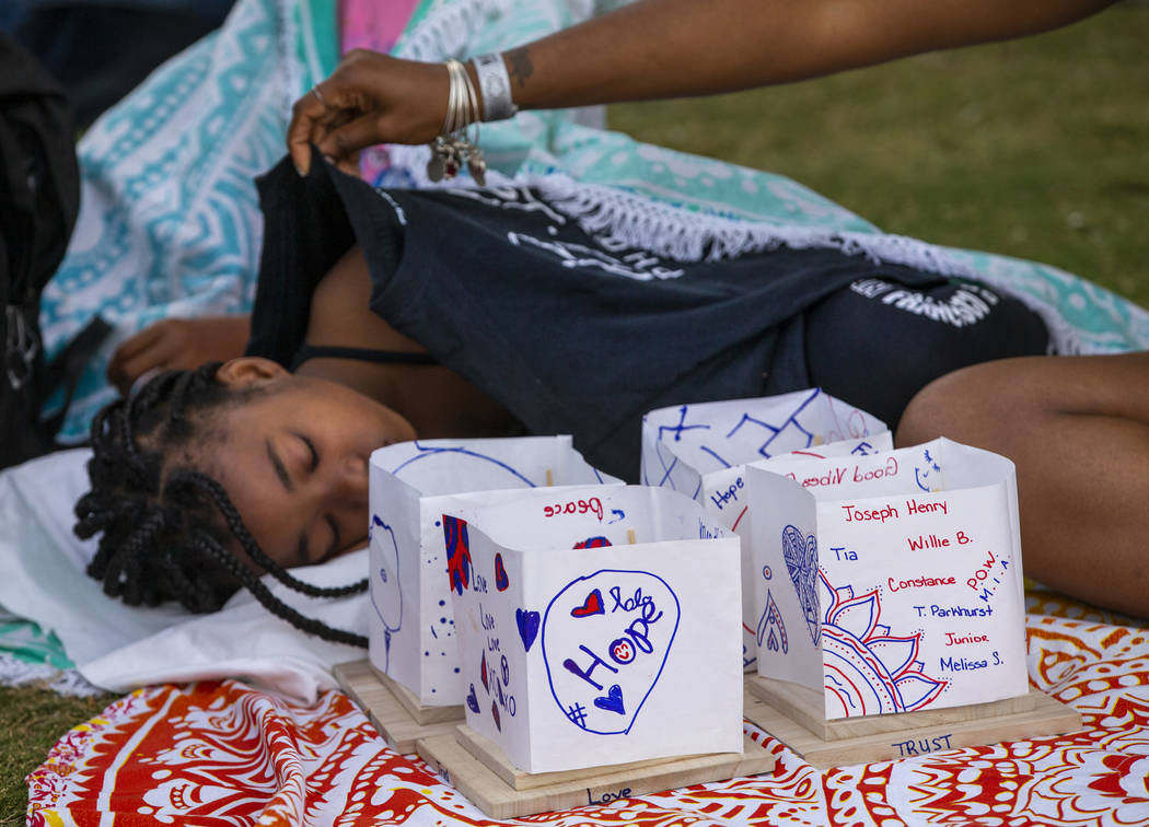 Jaiden Hammett, 10, is covered up for a quick nap before the floating starts during the Water L ...