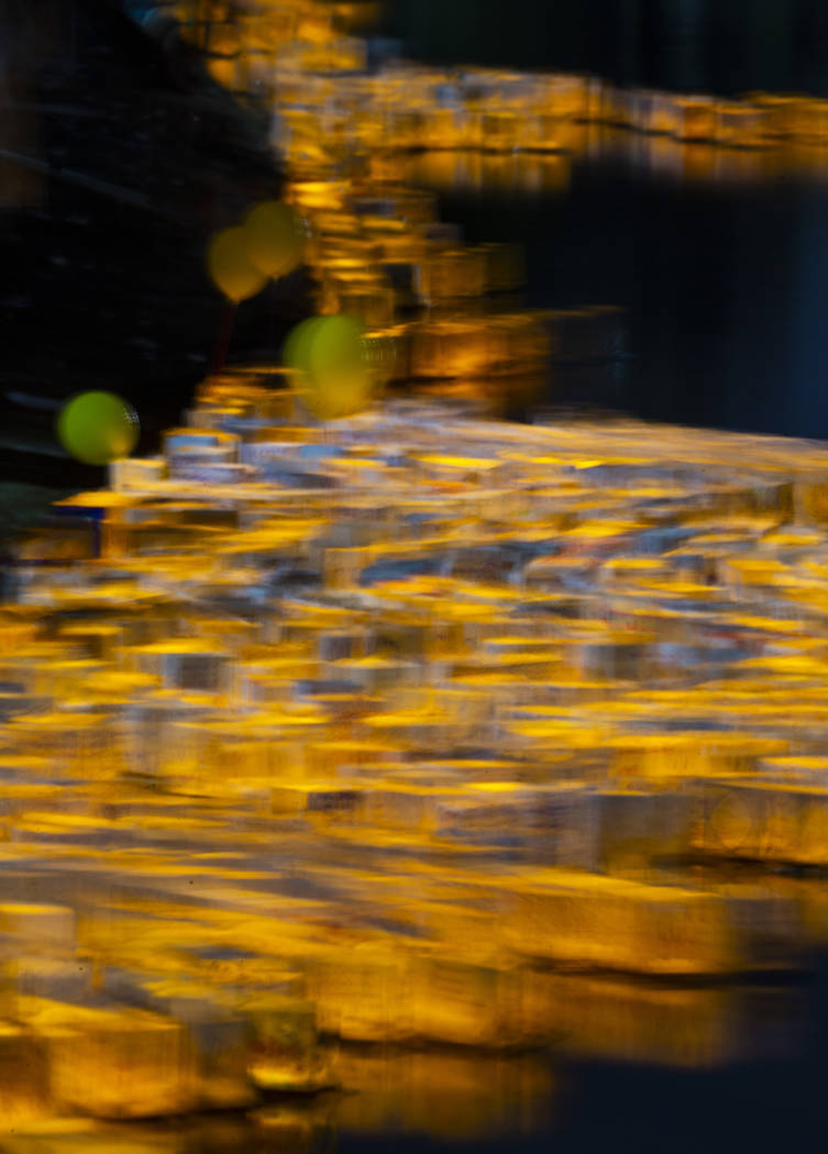 Strong winds didn't deter many from creating and launching their lanterns during the Water Lant ...