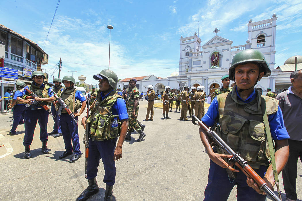 Sri Lankan Army soldiers secure the area around St. Anthony Shrine after a blast in Colombo, Sr ...