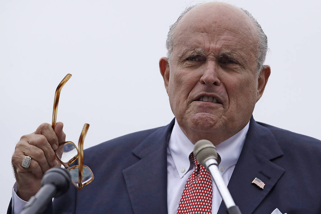 FILE - In this Aug. 1, 2018, file photo, Rudy Giuliani, an attorney for President Donald Trump, ...
