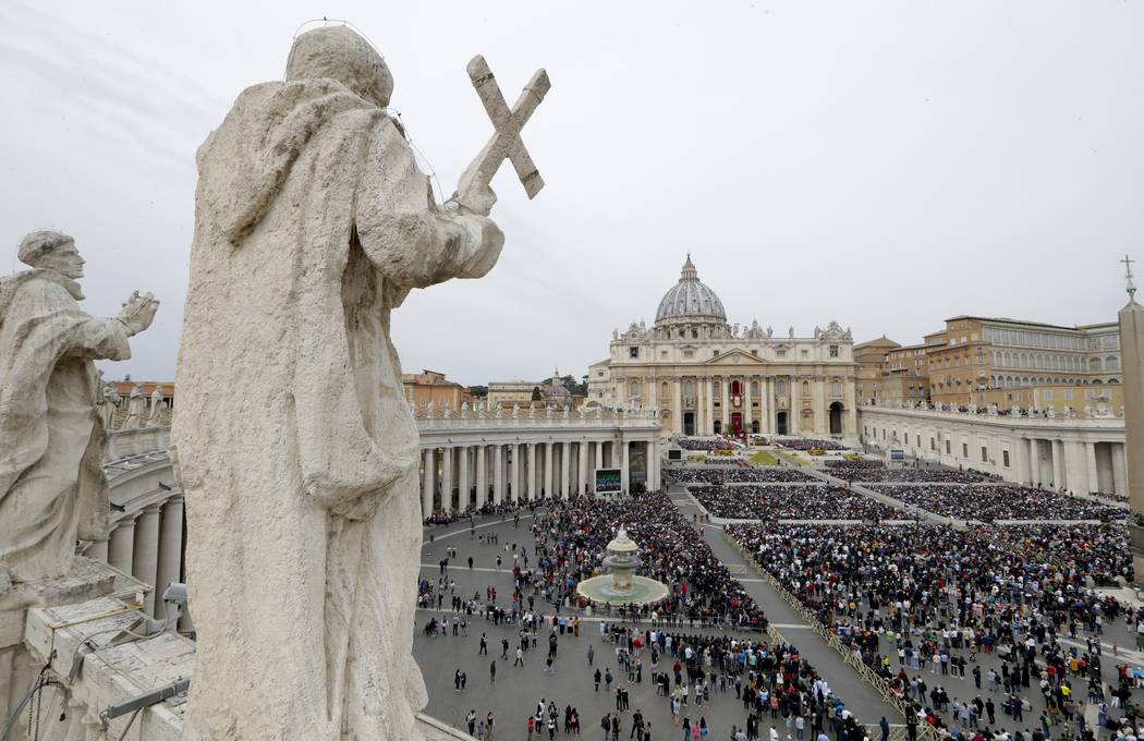 Faithful gather to follow Pope Francis celebrating Easter Mass in St. Peter's Square at the Vat ...