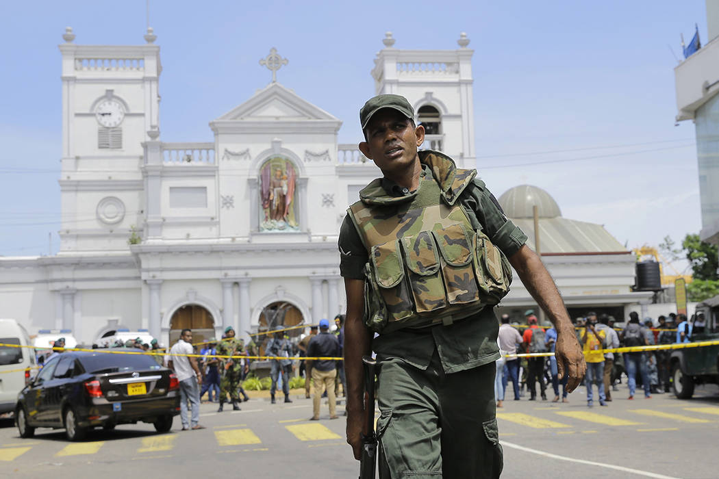 Sri Lankan Army soldiers secure the area around St. Anthony's Shrine after a blast in Colombo, ...