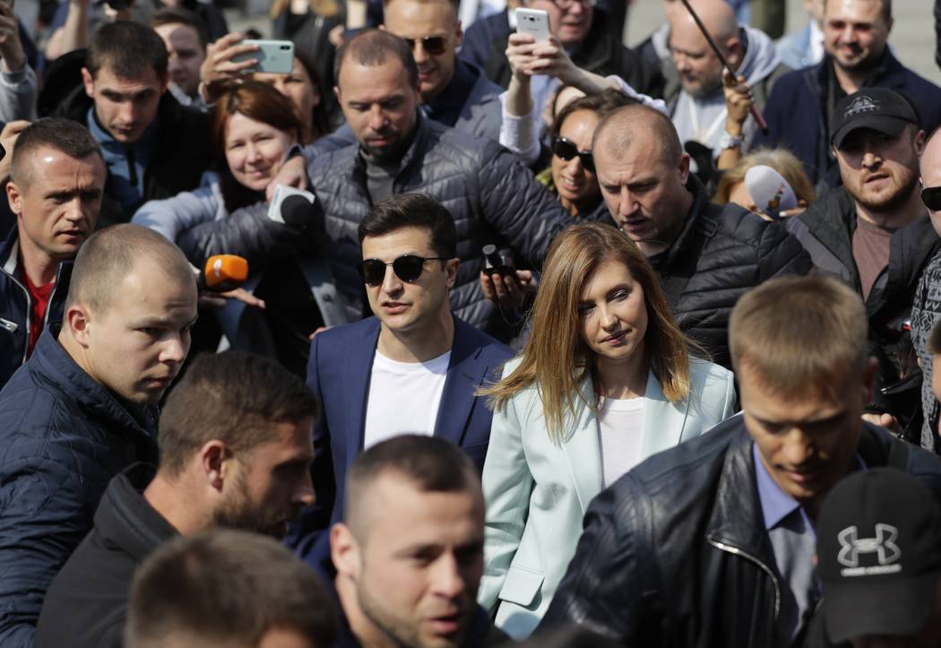 Ukrainian comedian and presidential candidate Volodymyr Zelenskiy, center left, and his Olena Z ...