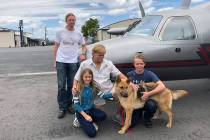 In this photo provided by the Humane Society of Broward County, kneeling from left to right, Ch ...