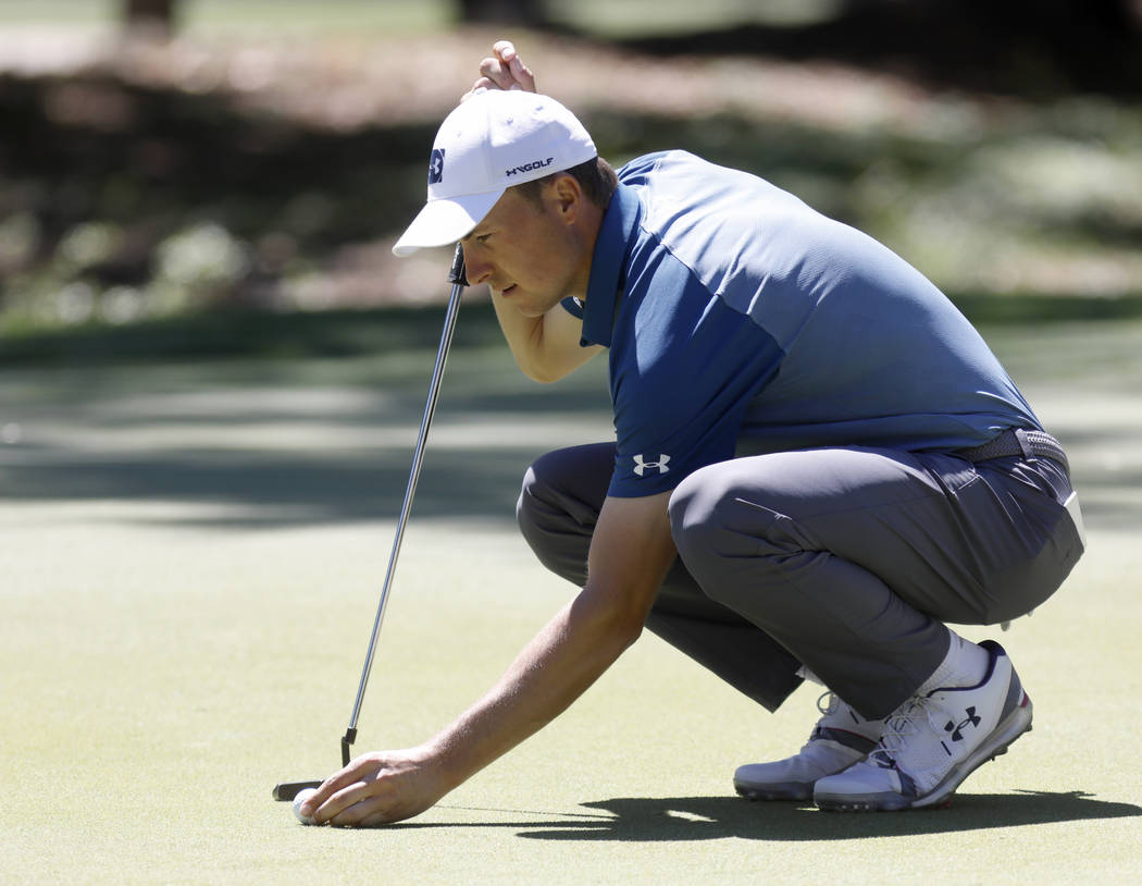 Jordan Spieth lines up his putt on the seventh hole during the final round of the RBC Heritage ...