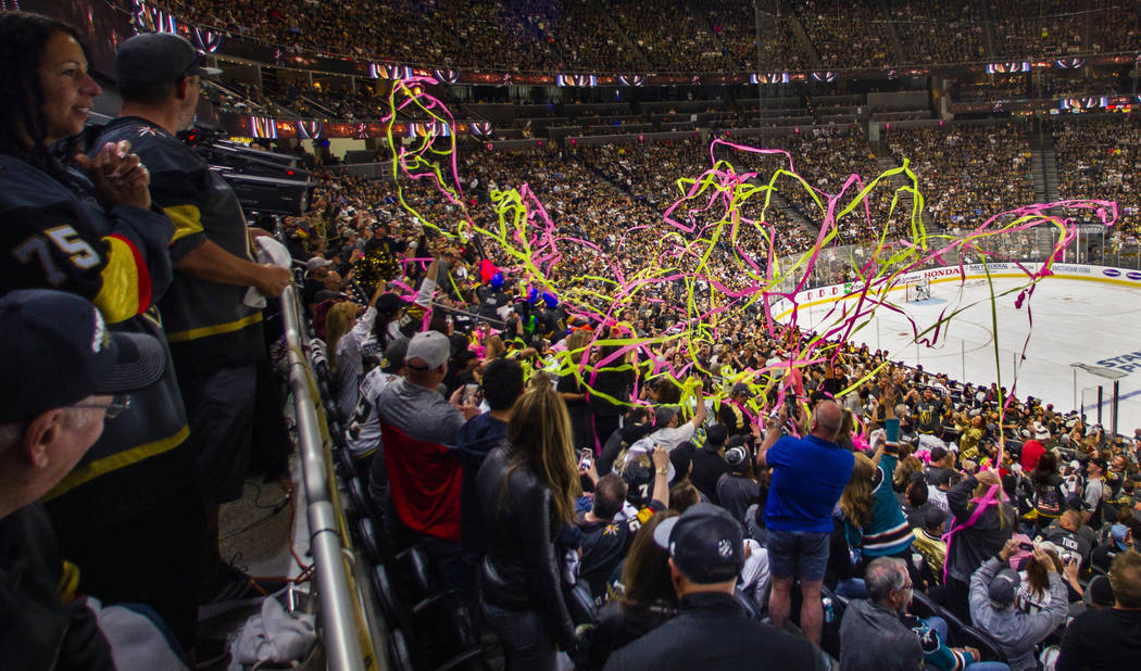 Fans are covered with streamers during the second overtime period of Game 6 of an NHL Western C ...