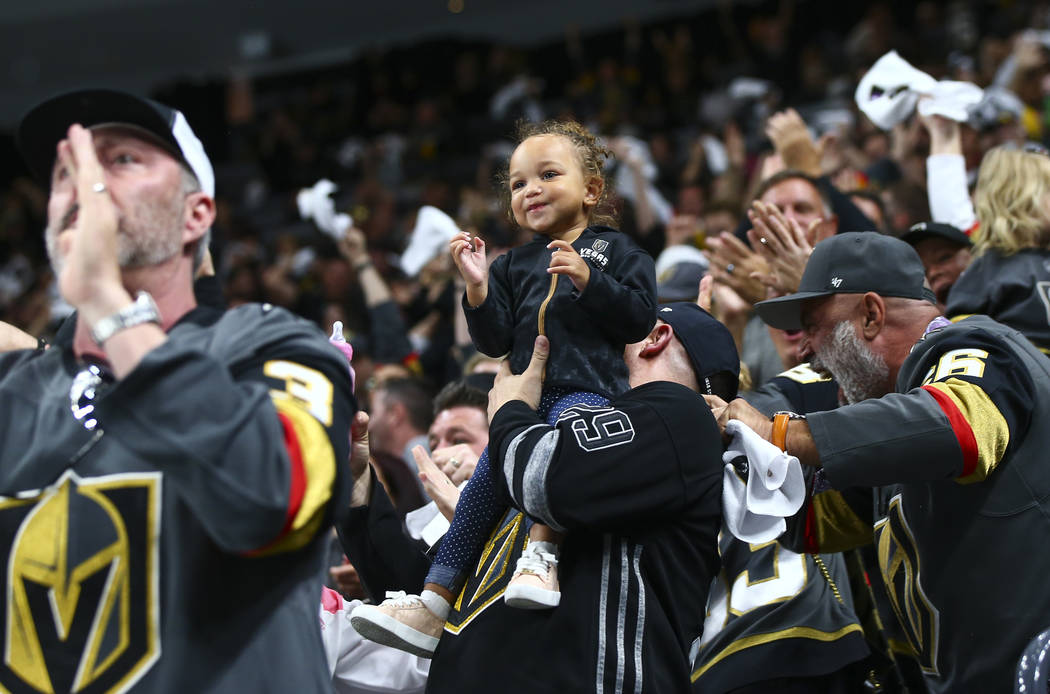 Golden Knights fans celebrate a goal by Golden Knights center Jonathan Marchessault, not pictur ...