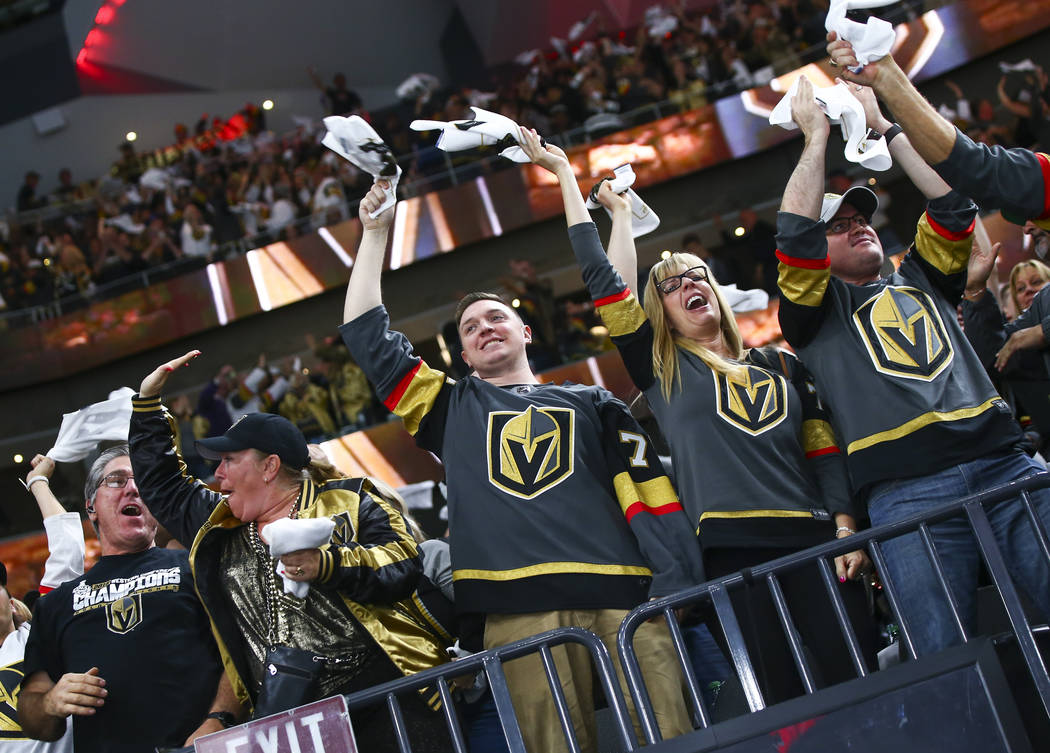 Golden Knights fans celebrate a goal by Golden Knights center Jonathan Marchessault, not pictur ...