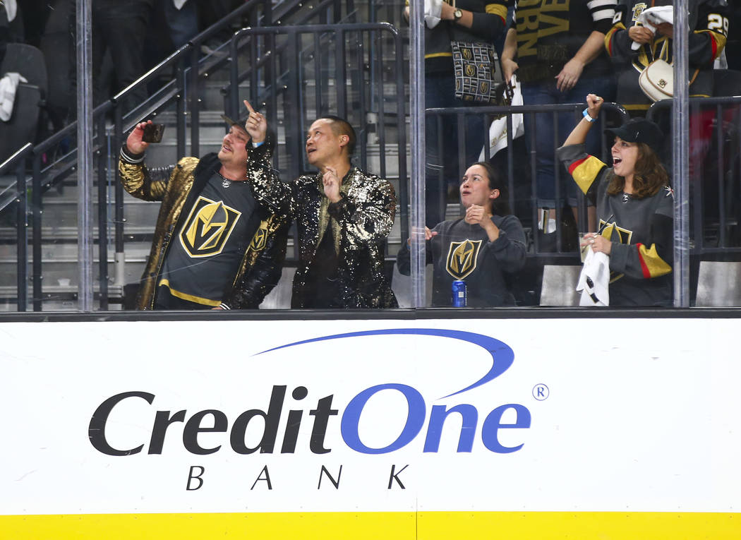 Golden Knights fans celebrate a goal by Golden Knights center Jonathan Marchessault, not pictur ...